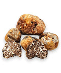 Artisanal Fresh Spring Tuber Borchii Truffle assortment with white and brown speckles